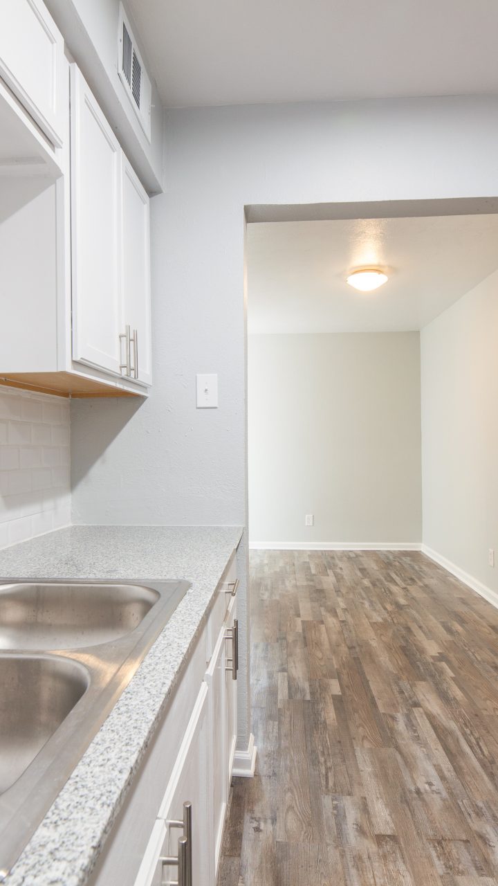 kitchen stainless sink white backsplash